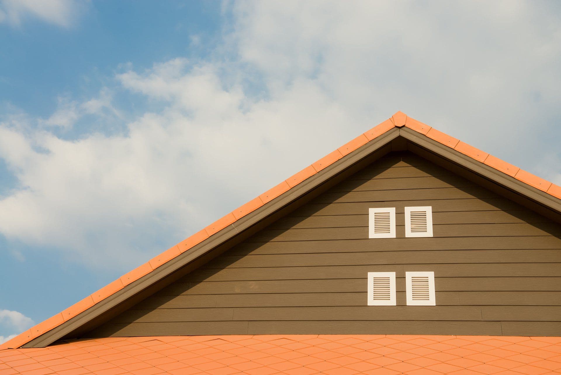 Savage home with new roof and siding on an orange gable