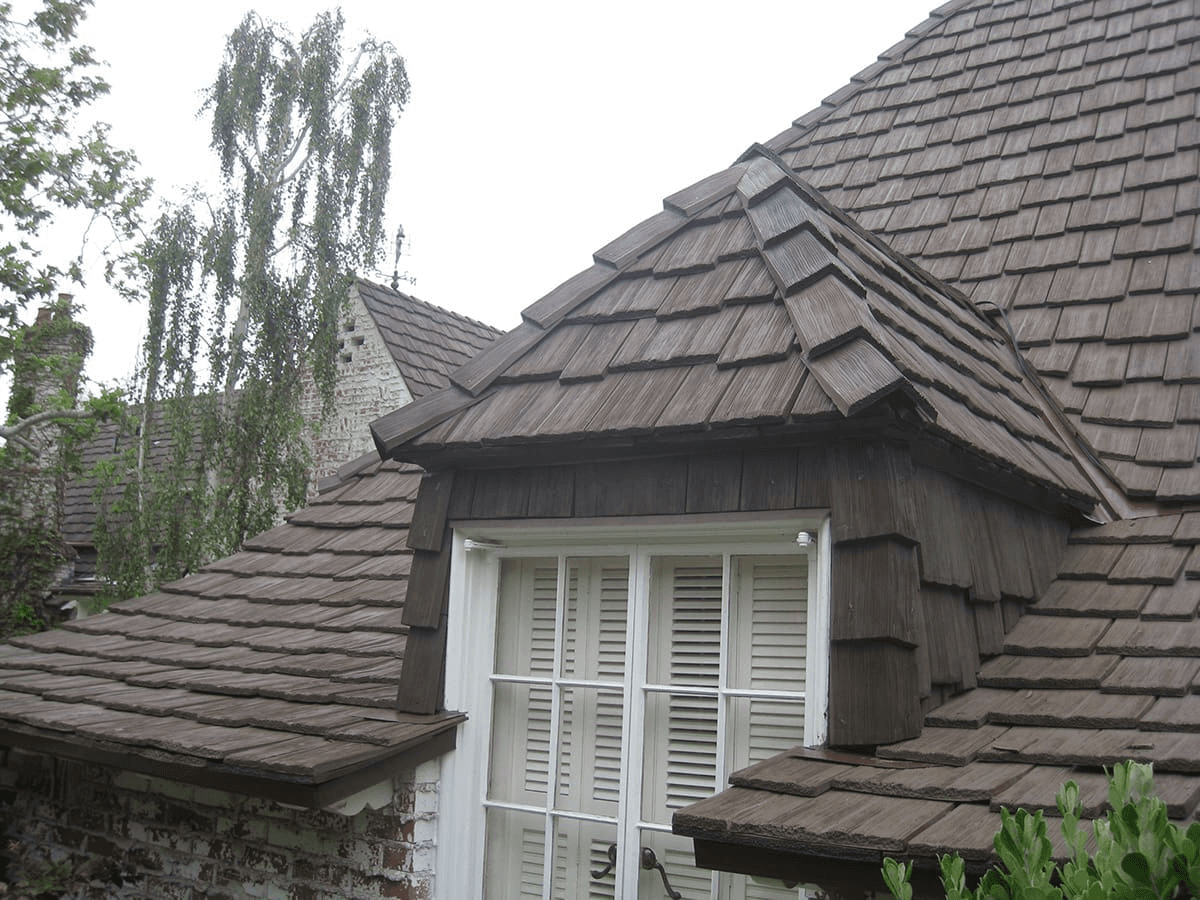 Close-up cedar shake detail on a Twin Cities home