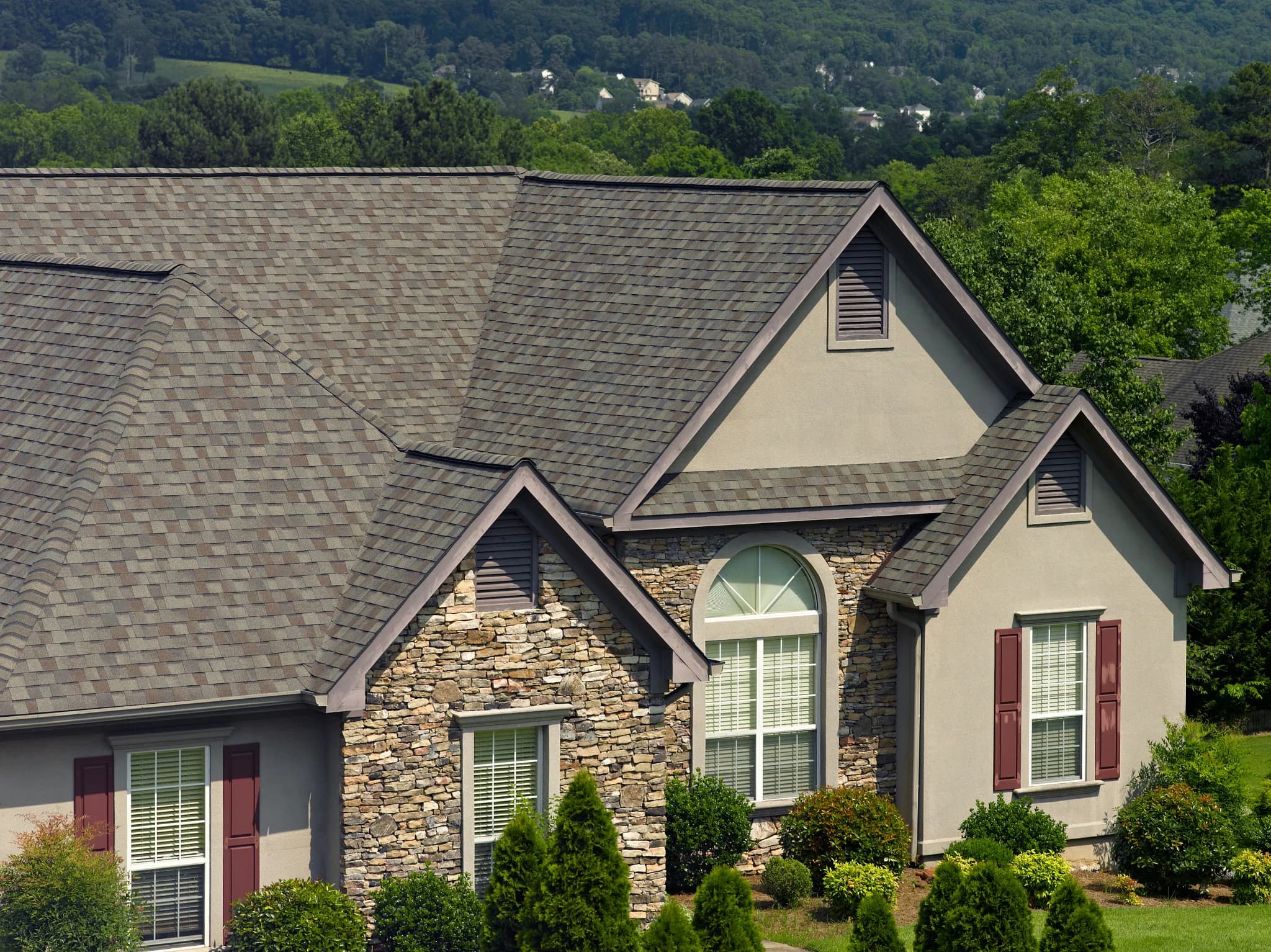 Home with red shutters and CertainTeed Landmark Weathered Wood roof