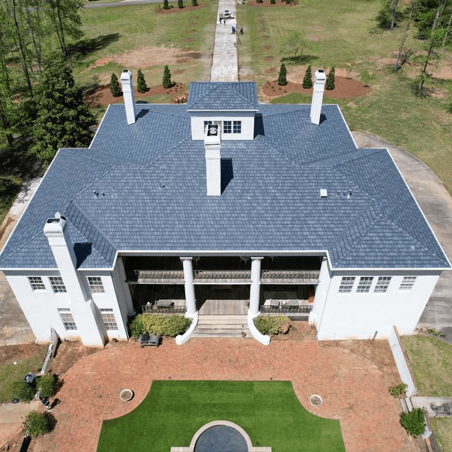EDCO Arrowline stone-coated steel shake roof on a Carver County style home