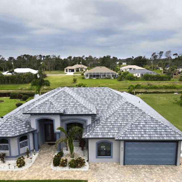 Carver County-style home with EDCO Arrowline stone-coated steel shake roof