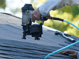 Certified crew installing CertainTeed Landmark shingles