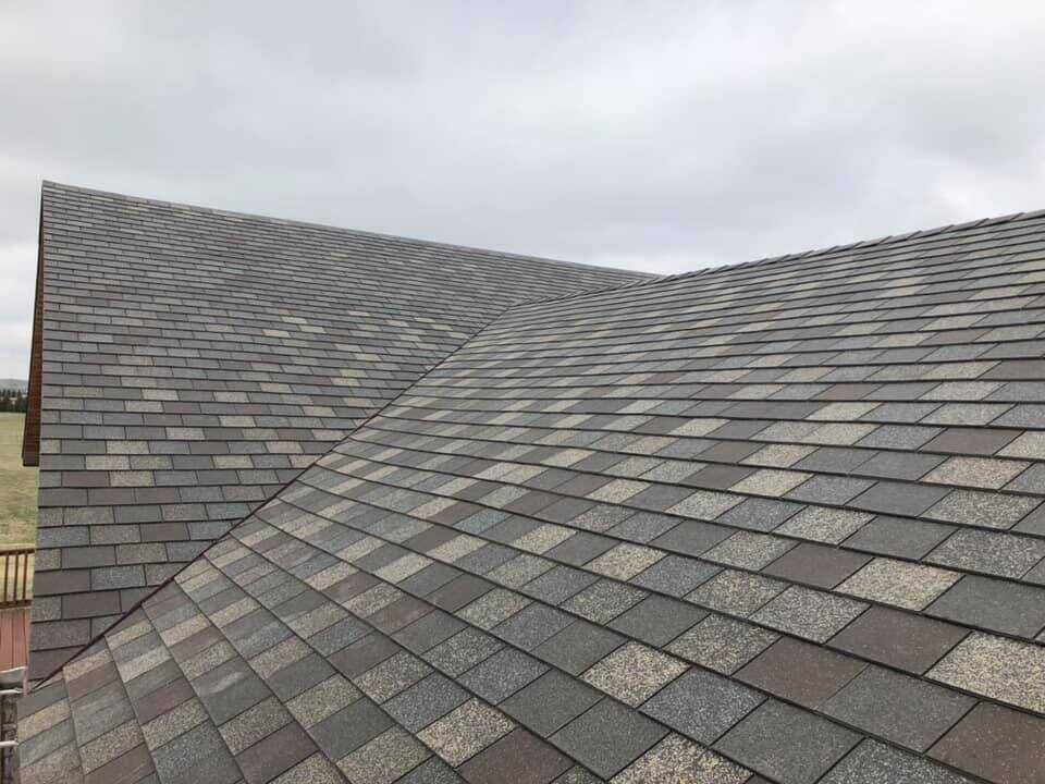Newly installed asphalt shingle roof showing pattern and texture
