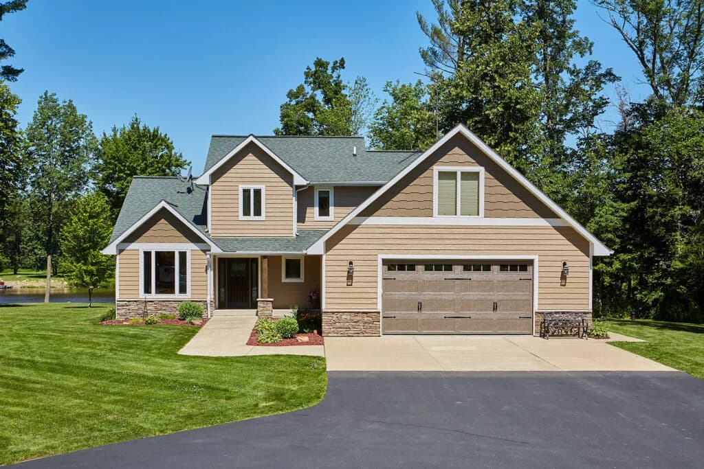 DiamondKote siding in French Gray with white trim on a Twin Cities home — Modex install