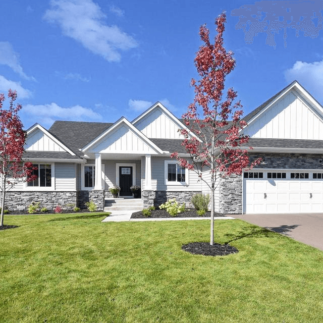 EDCO Entex Series Driftwood Gray with Glacier White trim on a residential home